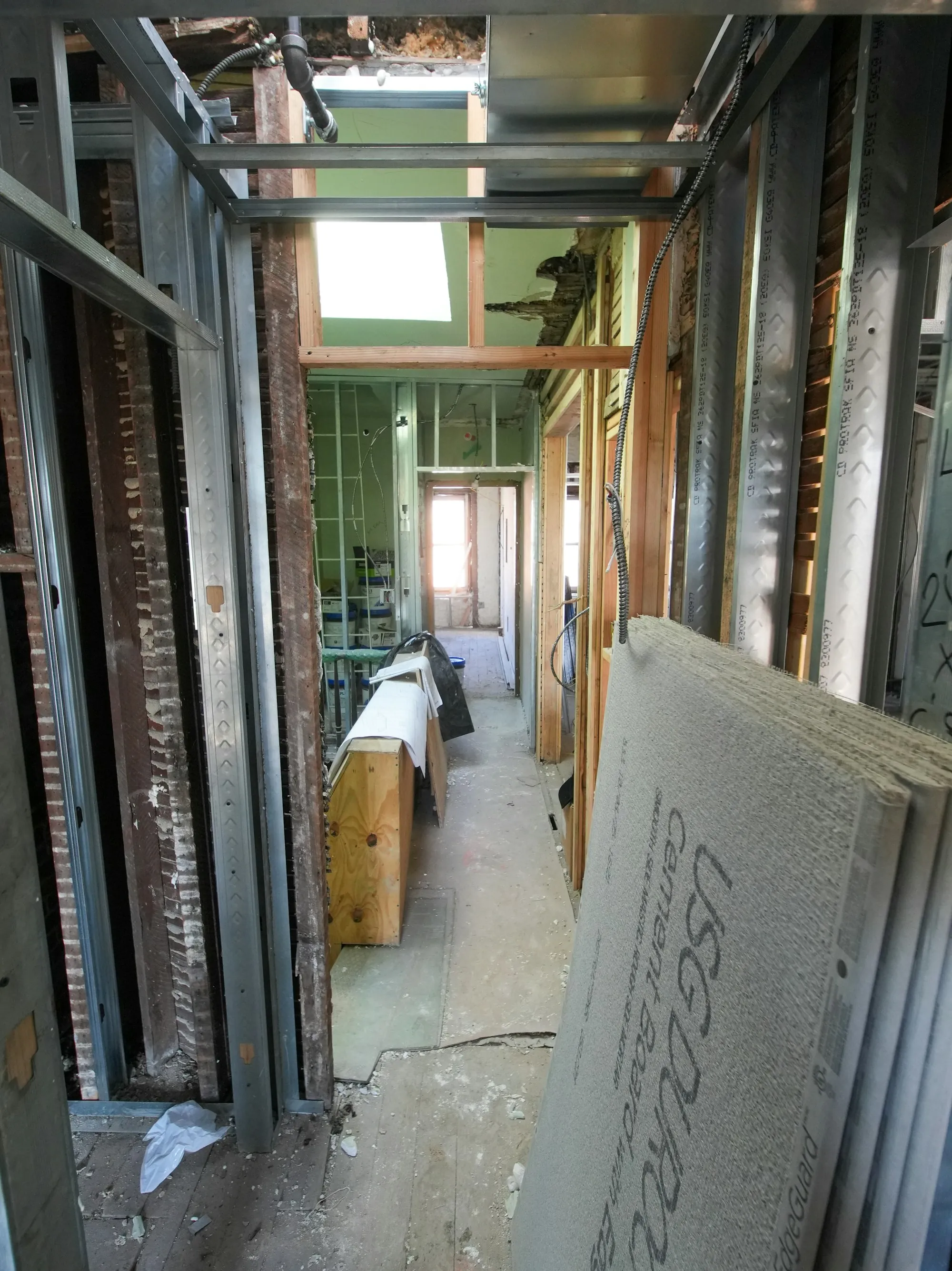 Interior renovation with stacked drywall